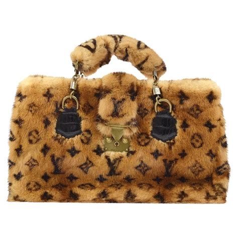 louis vuitton purse with accent faux fur black handle|Louis Vuitton black checkered purse.